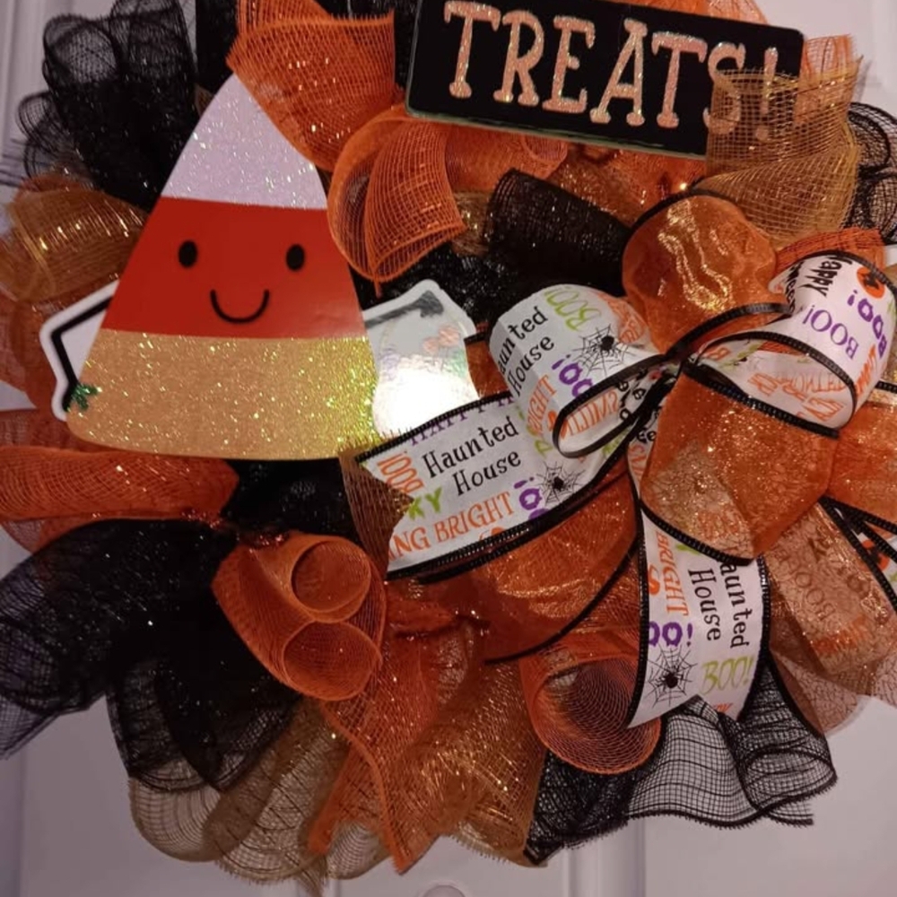 Festive Halloween Wreath with Orange and Black Accents